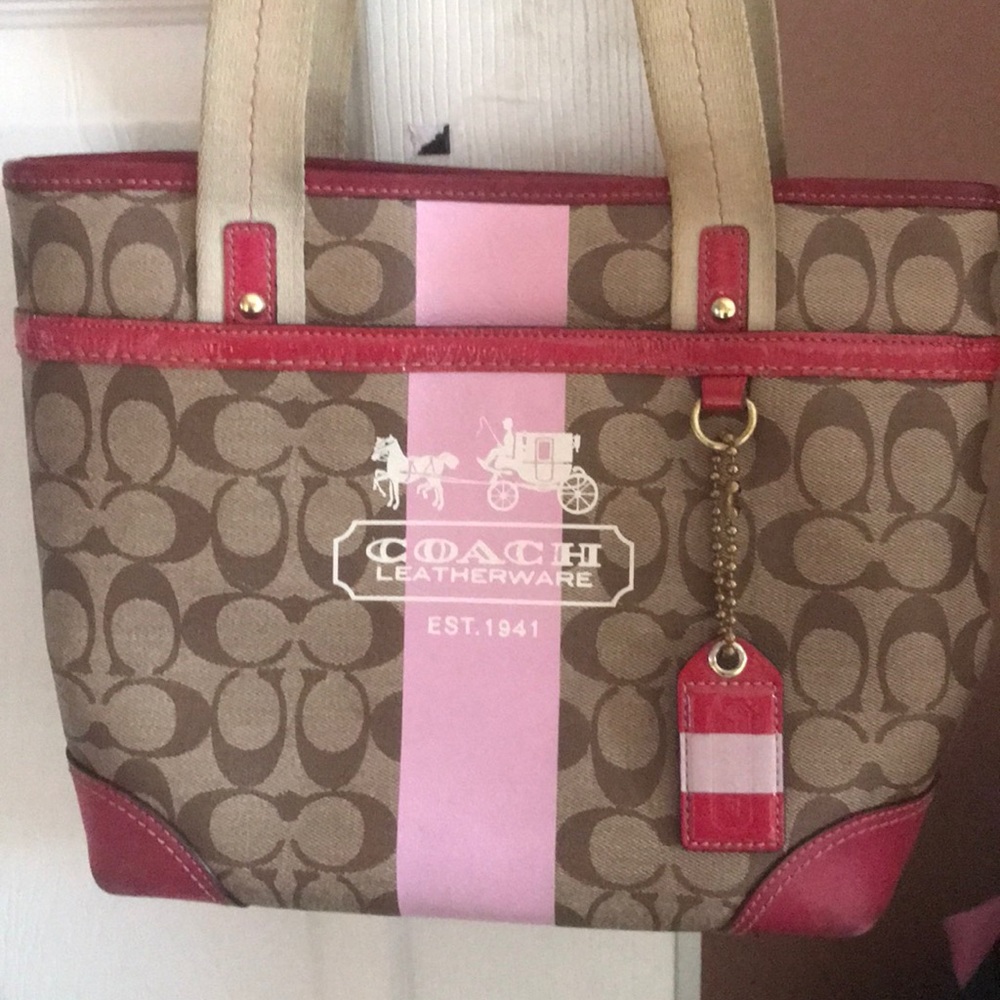 Classic pink and tan coach bag